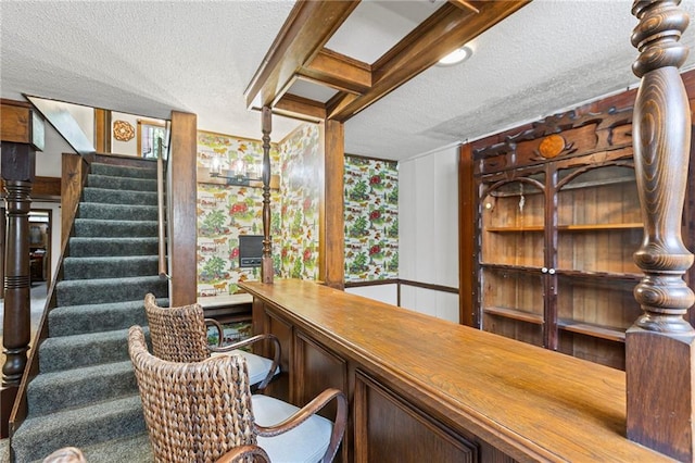 1124 S Locust St, Ottawa, KS 66067 - bar with a textured ceiling and stairs