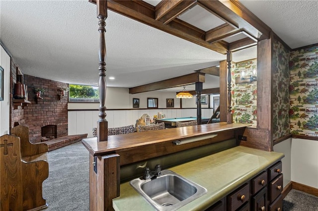 1124 S Locust St, Ottawa, KS 66067 - bar with a textured ceiling, carpet flooring, and wallpapered walls