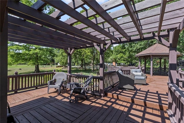 1124 S Locust St, Ottawa, KS 66067 - deck with a gazebo, a pergola, and a yard