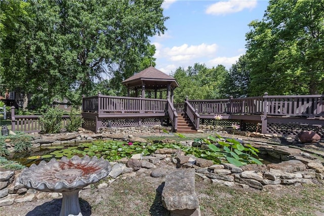 1124 S Locust St, Ottawa, KS 66067 - view of yard featuring a deck and a gazebo