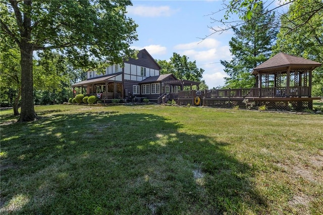 1124 S Locust St, Ottawa, KS 66067 - view of green lawn featuring a gazebo and a wooden deck