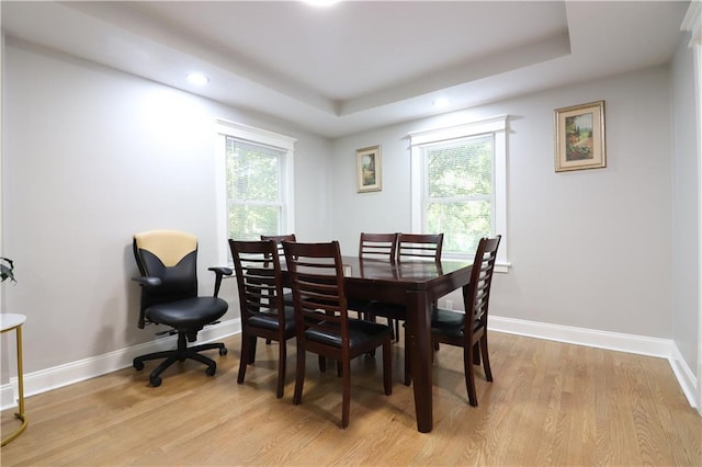 818 W 30th St, Independence, MO 64055 - dining area with healthy amount of natural light, light wood-style floors, recessed lighting, and a tray ceiling