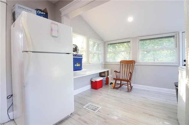 818 W 30th St, Independence, MO 64055 - kitchen featuring freestanding refrigerator, lofted ceiling, light wood-style flooring, and recessed lighting