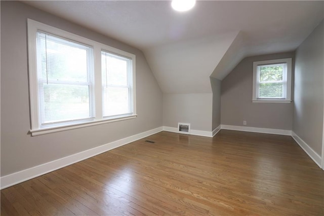 818 W 30th St, Independence, MO 64055 - bonus room with wood finished floors and lofted ceiling