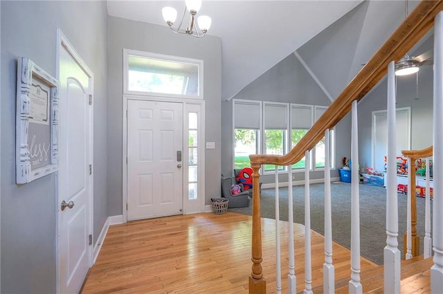 3945 N 123rd Ter, Kansas City, KS 66109 - entryway featuring light wood-type flooring, a chandelier, and healthy amount of natural light
