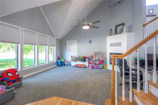 3945 N 123rd Ter, Kansas City, KS 66109 - recreation room with high vaulted ceiling, ceiling fan, and carpet flooring