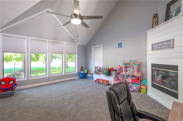 3945 N 123rd Ter, Kansas City, KS 66109 - game room featuring carpet flooring, high vaulted ceiling, ceiling fan, and a glass covered fireplace