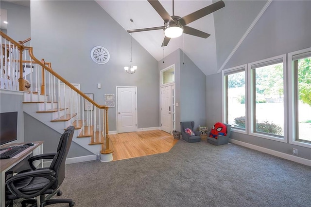 3945 N 123rd Ter, Kansas City, KS 66109 - unfurnished office with high vaulted ceiling, carpet, ceiling fan, and a chandelier