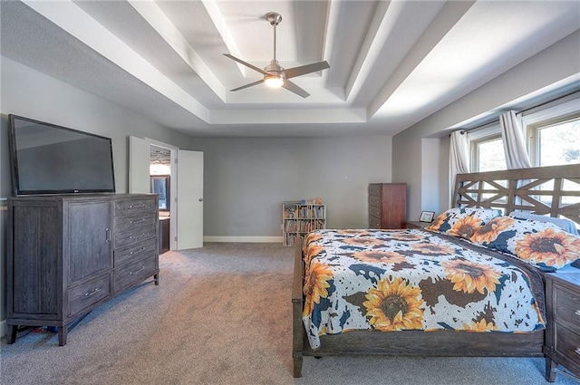 3945 N 123rd Ter, Kansas City, KS 66109 - bedroom featuring carpet floors, a tray ceiling, and ceiling fan