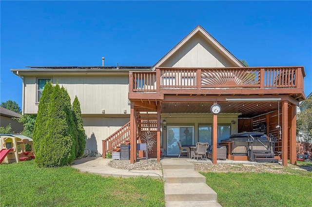 3945 N 123rd Ter, Kansas City, KS 66109 - rear view of property with a wooden deck, stairway, a lawn, and a patio area