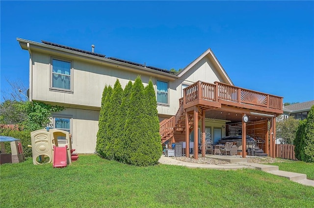 3945 N 123rd Ter, Kansas City, KS 66109 - back of house with stairs, a wooden deck, and a patio