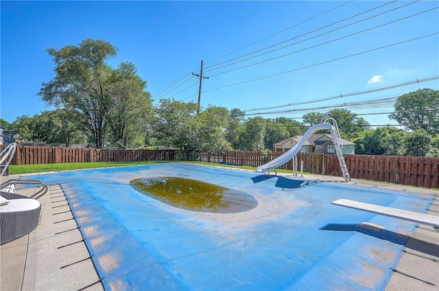 3945 N 123rd Ter, Kansas City, KS 66109 - view of pool with a fenced backyard and a patio area