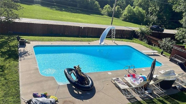 3945 N 123rd Ter, Kansas City, KS 66109 - view of pool with a fenced backyard, a water slide, and a patio