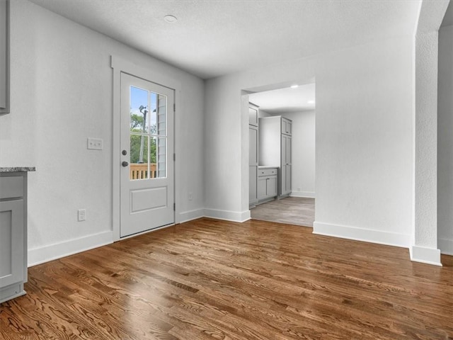 2832 Rushmore Ln, Saint Joseph, MO 64505 - foyer featuring wood finished floors and baseboards