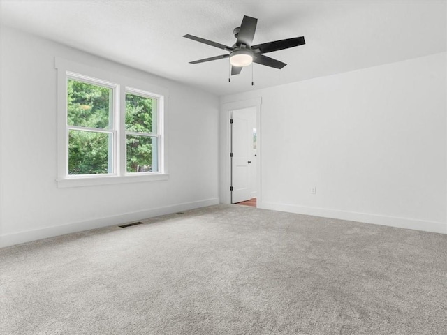 2832 Rushmore Ln, Saint Joseph, MO 64505 - carpeted empty room featuring baseboards and a ceiling fan