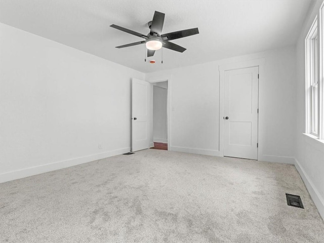 2832 Rushmore Ln, Saint Joseph, MO 64505 - unfurnished bedroom with carpet and ceiling fan