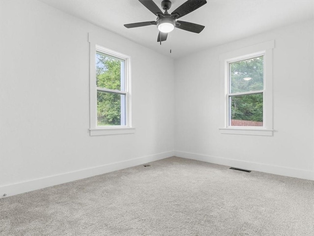2832 Rushmore Ln, Saint Joseph, MO 64505 - carpeted spare room featuring baseboards and a ceiling fan