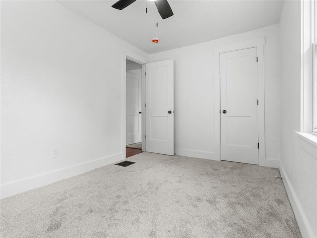 2832 Rushmore Ln, Saint Joseph, MO 64505 - unfurnished bedroom with carpet floors and ceiling fan