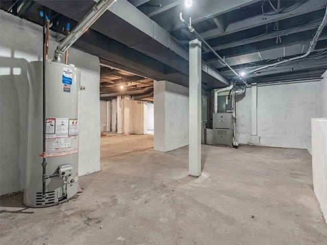 2832 Rushmore Ln, Saint Joseph, MO 64505 - unfinished basement featuring gas water heater and heating unit