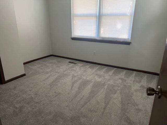 10195 Haskins St, Lenexa, KS 66217 - carpeted spare room with baseboards