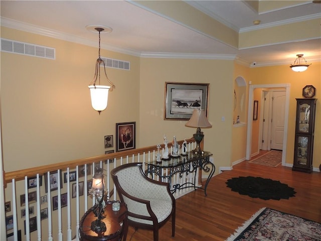 3722 S Bolger Ct, Independence, MO 64055 - corridor featuring wood finished floors, arched walkways, and crown molding