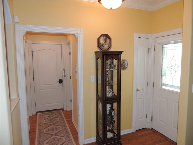 3722 S Bolger Ct, Independence, MO 64055 - foyer featuring wood finished floors and crown molding