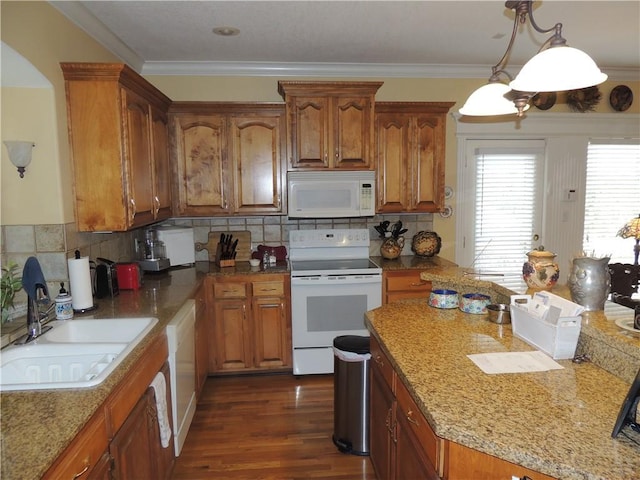 3722 S Bolger Ct, Independence, MO 64055 - kitchen featuring white appliances, brown cabinets, tasteful backsplash, crown molding, and dark wood-style floors