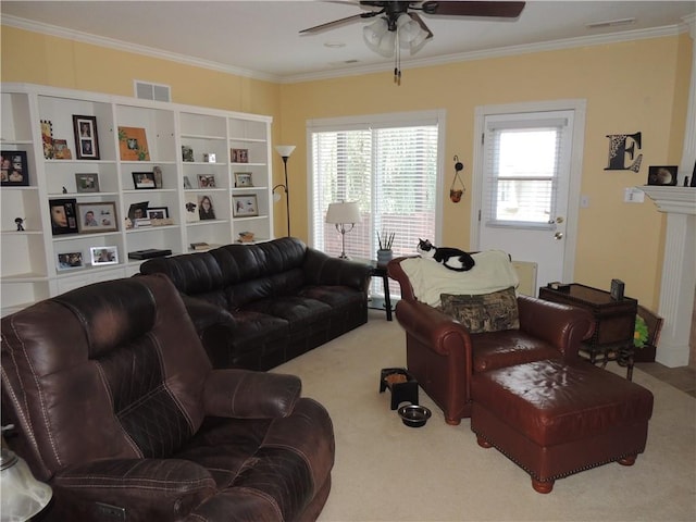3722 S Bolger Ct, Independence, MO 64055 - living room with a ceiling fan, carpet floors, and crown molding