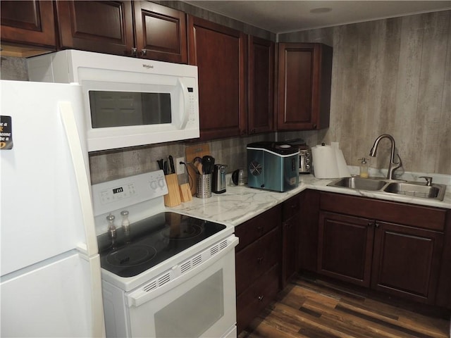 3722 S Bolger Ct, Independence, MO 64055 - kitchen featuring white appliances, light countertops, dark wood-style flooring, and tasteful backsplash