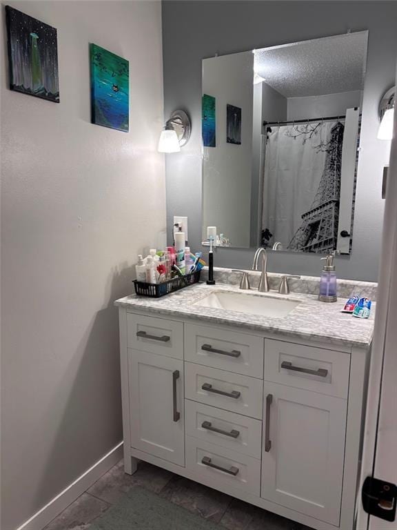 3335 N 54th St, Kansas City, KS 66104 - bathroom with vanity and a textured ceiling