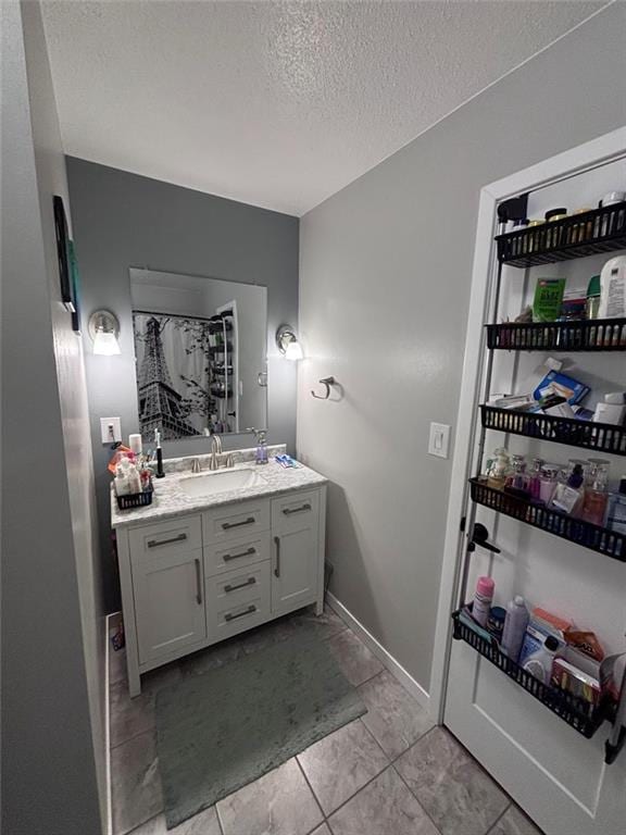 3335 N 54th St, Kansas City, KS 66104 - bathroom featuring vanity and a textured ceiling
