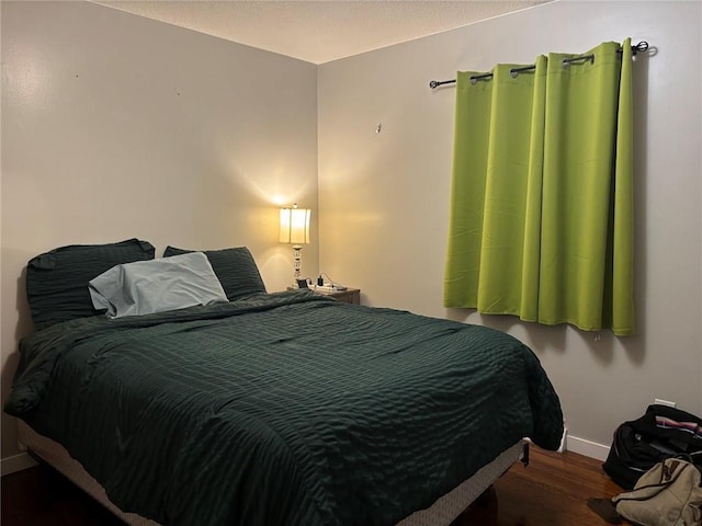 3335 N 54th St, Kansas City, KS 66104 - bedroom with wood finished floors and baseboards