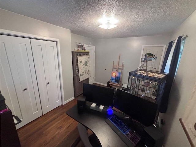 3335 N 54th St, Kansas City, KS 66104 - office with dark wood-style floors and a textured ceiling
