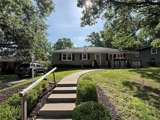 2425 Elephant Trl, Saint Joseph, MO 64506 - ranch-style house with a front lawn