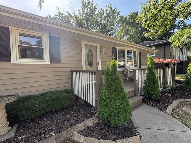 2425 Elephant Trl, Saint Joseph, MO 64506 - property entrance with a wooden deck