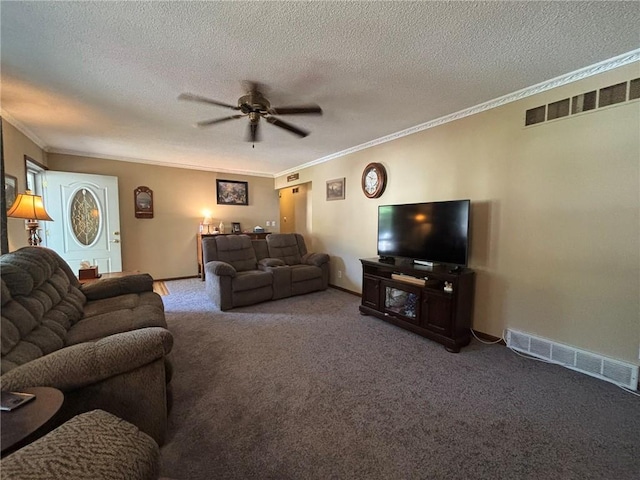 2425 Elephant Trl, Saint Joseph, MO 64506 - living room featuring crown molding, a ceiling fan, carpet flooring, and a textured ceiling
