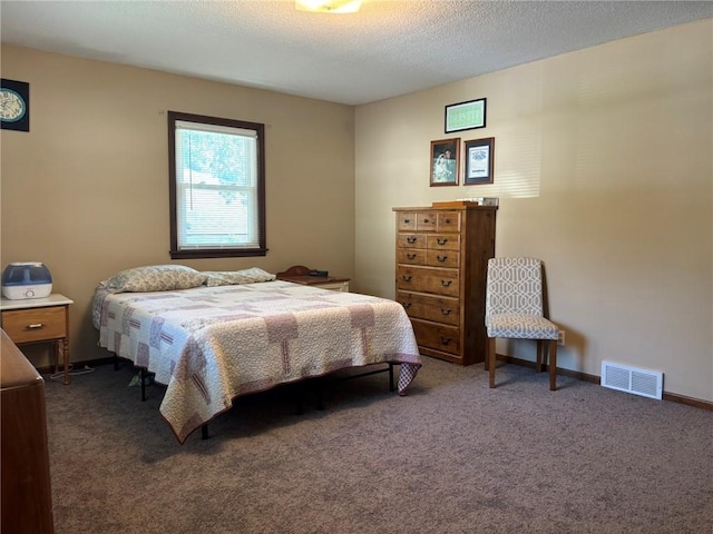 2425 Elephant Trl, Saint Joseph, MO 64506 - bedroom with carpet floors and a textured ceiling