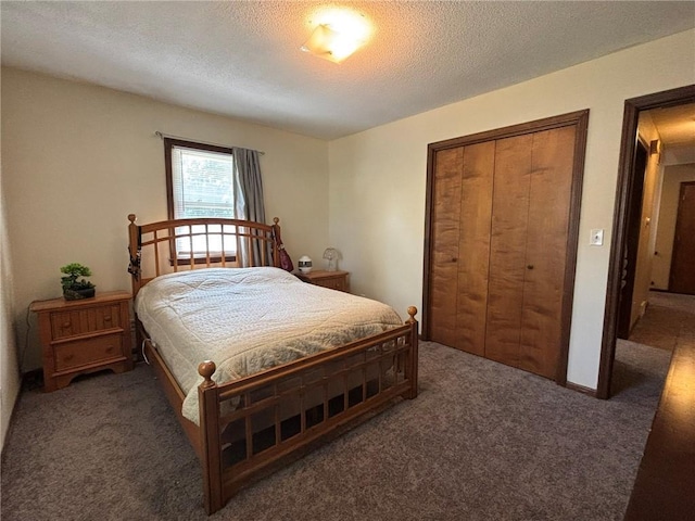 2425 Elephant Trl, Saint Joseph, MO 64506 - carpeted bedroom with a textured ceiling and a closet