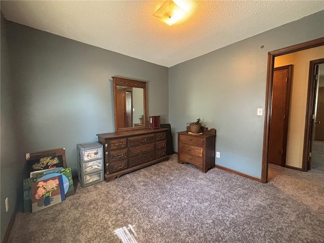 2425 Elephant Trl, Saint Joseph, MO 64506 - bedroom featuring carpet and a textured ceiling