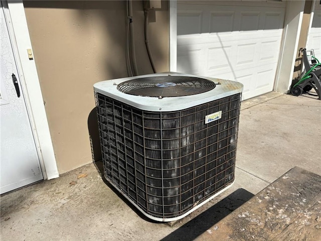 2425 Elephant Trl, Saint Joseph, MO 64506 - exterior view of a central AC unit and stucco siding