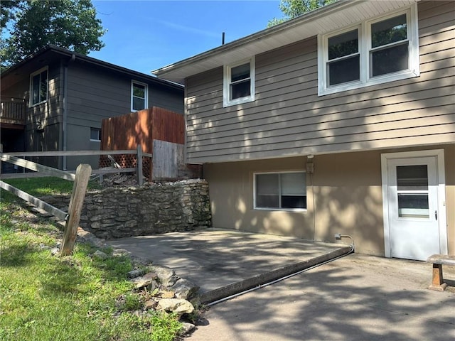 2425 Elephant Trl, Saint Joseph, MO 64506 - rear view of house with a patio area