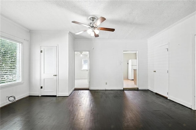 216 Dunbar Ave, Excelsior Springs, MO 64024 - unfurnished bedroom featuring crown molding, freestanding refrigerator, a textured ceiling, dark wood-style flooring, and a ceiling fan