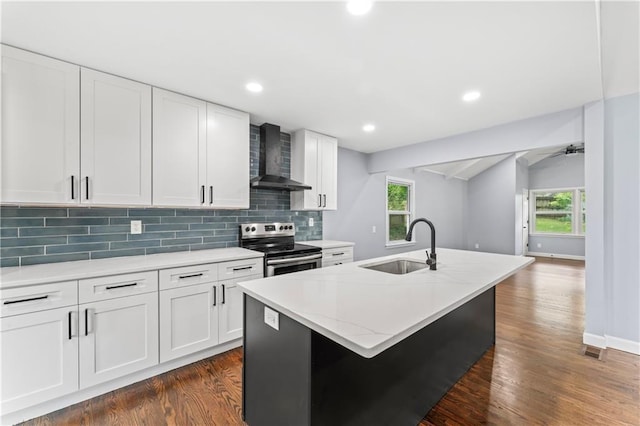 9916 Floyd St, Overland Park, KS 66212 - kitchen with electric range, wall chimney range hood, decorative backsplash, dark wood-type flooring, and lofted ceiling