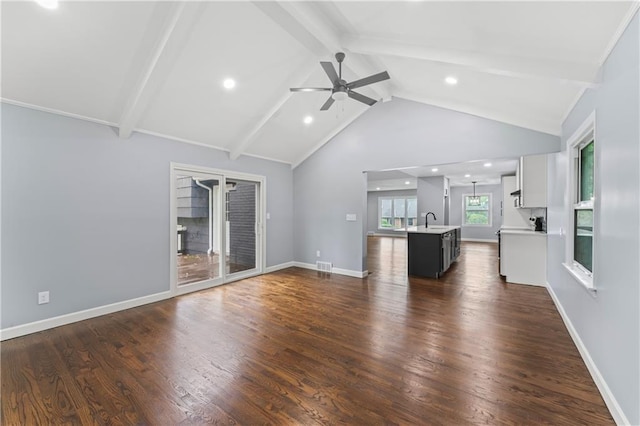 9916 Floyd St, Overland Park, KS 66212 - unfurnished living room featuring ceiling fan, dark wood finished floors, and recessed lighting