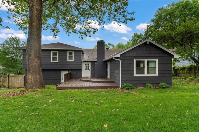 9916 Floyd St, Overland Park, KS 66212 - back of property featuring a chimney and a wooden deck