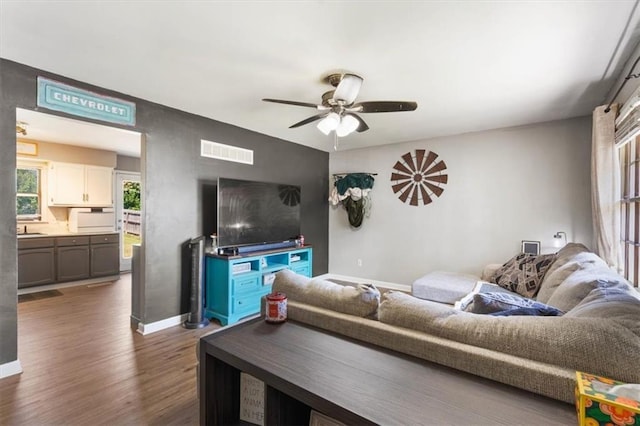 800 S Park Ave, Oak Grove, MO 64075 - living area with dark wood-style floors and a ceiling fan