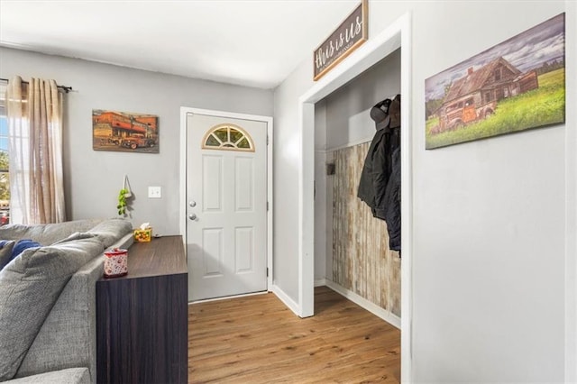 800 S Park Ave, Oak Grove, MO 64075 - entryway featuring light wood-type flooring and baseboards