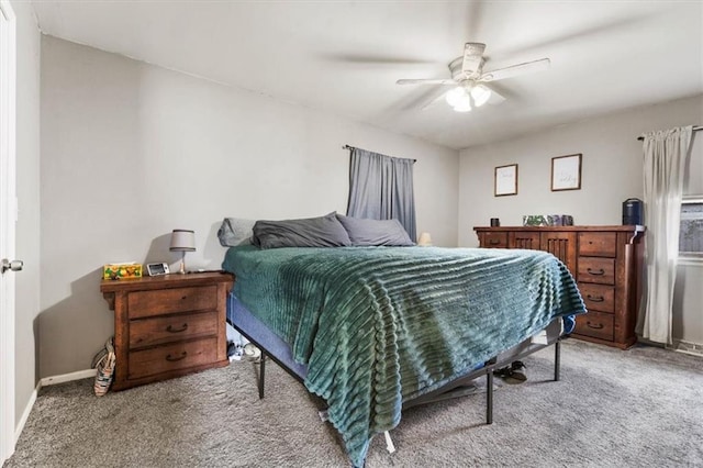 800 S Park Ave, Oak Grove, MO 64075 - bedroom with light carpet and a ceiling fan