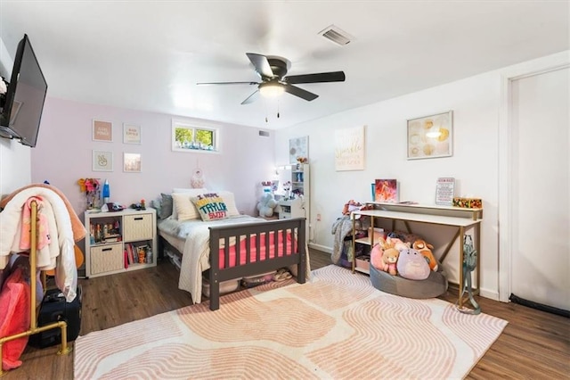 800 S Park Ave, Oak Grove, MO 64075 - bedroom featuring wood finished floors and ceiling fan