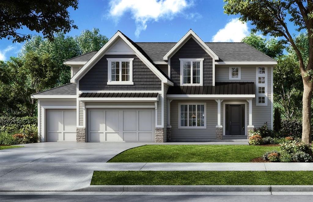 22015 W 80th Ter, Shawnee, KS 66220 - craftsman house with a standing seam roof, concrete driveway, stone siding, and a metal roof